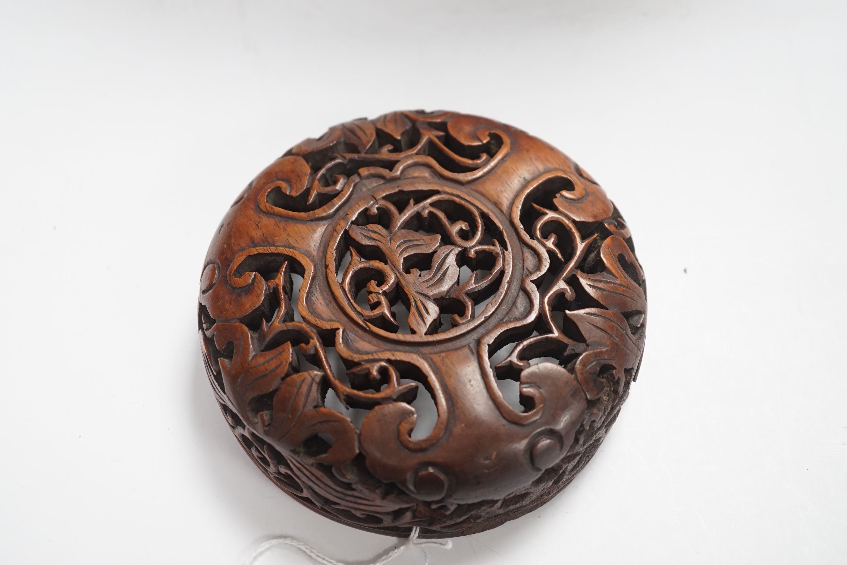 A large Chinese blue and white jar decorated with dragons chasing the flaming pearl together with unassociated carved wood lid and stand, 35cm high